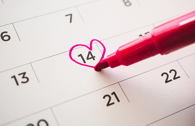 Pen mark heart shape on calendar date at 14th valentine day